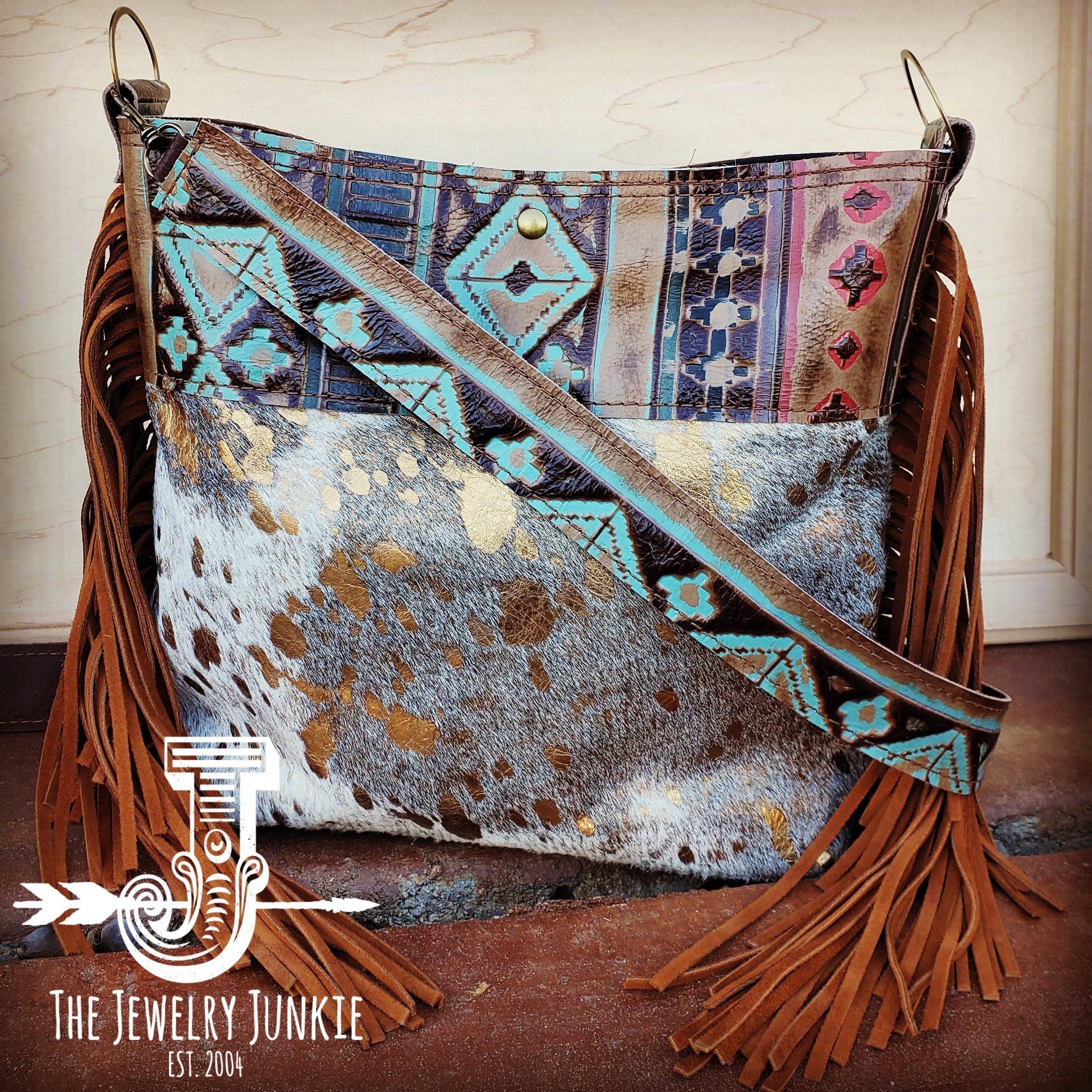 New Statement Bag! Cowhide, fringe and a bold belt buckle all in