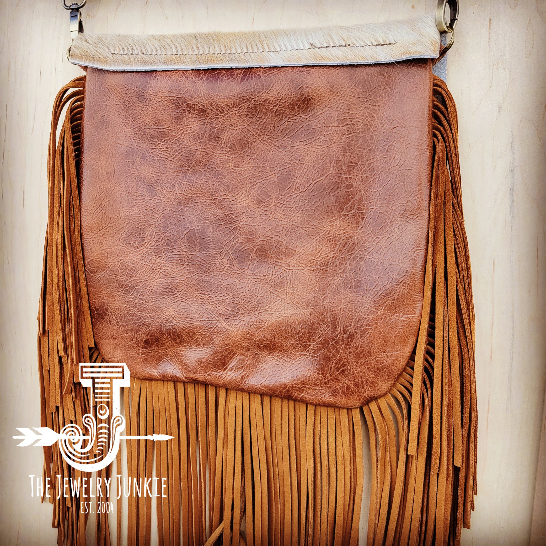 Faux leather boho fringe saddle tan purse with artisan leather handmade  brooch on flap for just a fun touch of color, boho western